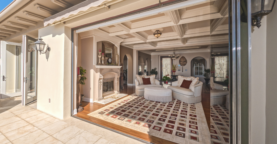 Living room with frameless glass doors