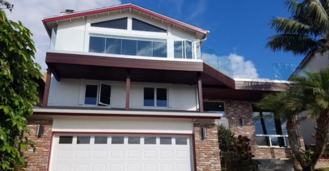 Exterior of house with new Cover Glass frameless glass system