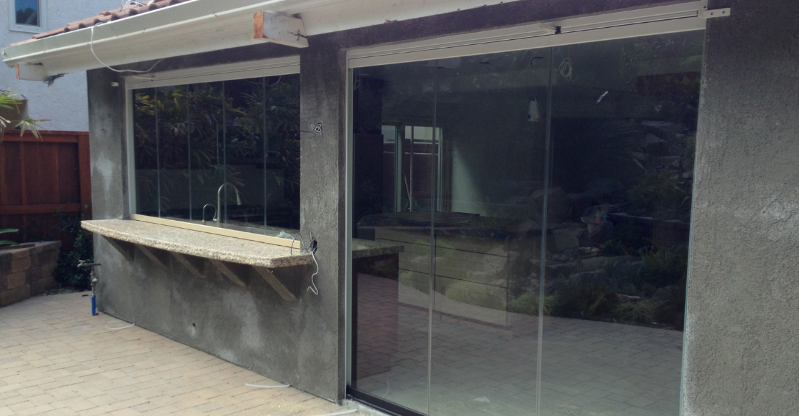 Cover Glass frameless glass window and door system installation 