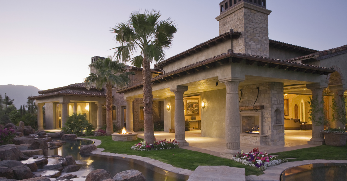 Mediterranean-style home with stone vaneer 