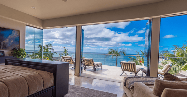 ocean view bedroom frameless glass