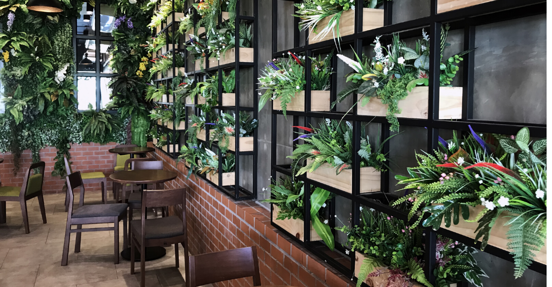 Coffee shop with a plant wall