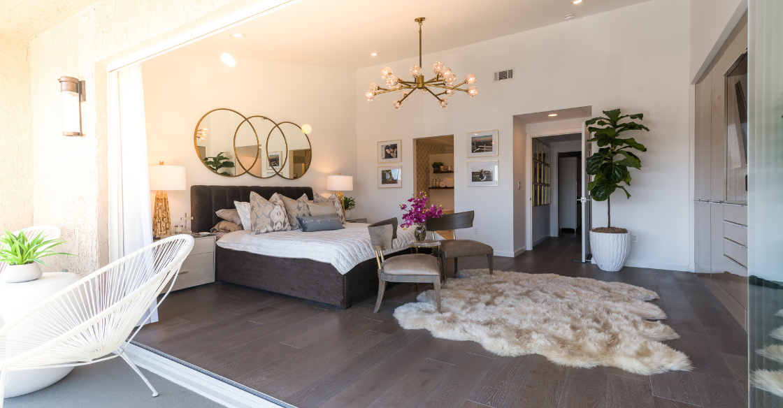 Bedroom with beautiful and modern frameless glass doors