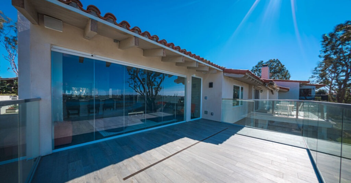 Patio with frameless glass doors